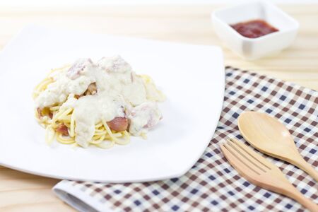 Spaghetti on wooden backgroundの写真素材