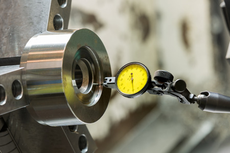 industrial metal work machining process by cutting tool on CNC latheの写真素材