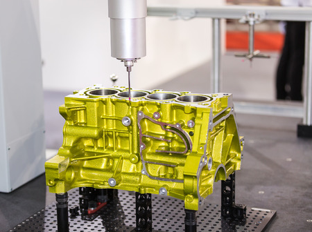 operator inspection dimension aluminium automotive part  by CMM after machining in industrial factoryの写真素材