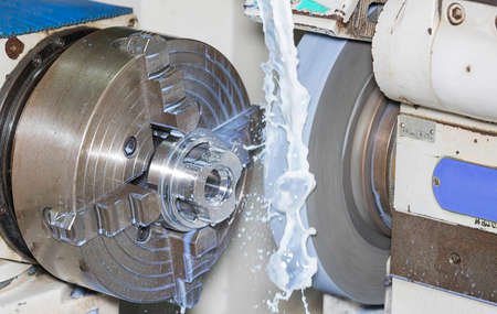 operator grinding mold and die part by universal grining machine in factory_01の写真素材