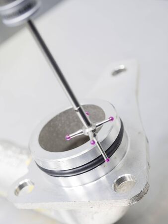 inspection automotive aluminum machining parts dimension by CMM measuring machineの写真素材