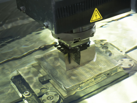 operator use graphite EDM electrod to make precision mold and dieの写真素材