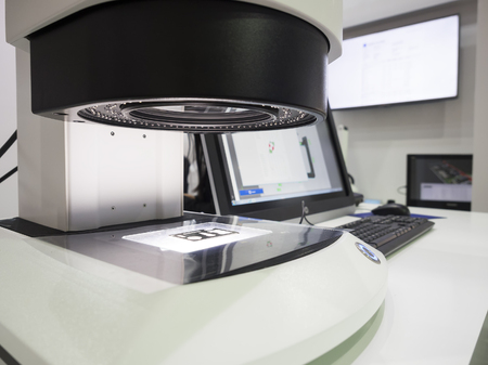 operator inspection high precision part by automate vision systemの写真素材