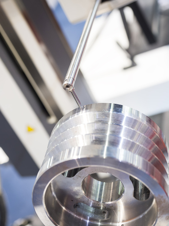 operator inspection automotive part by contour measuring machineの写真素材