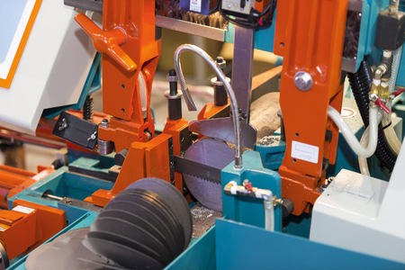 band saw cutting tool steel bar by automatic feedの写真素材