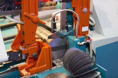 band saw cutting tool steel bar by automatic feedの写真素材