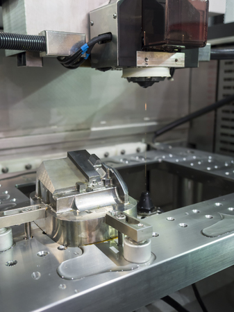 CNC wire cut machine cutting high precision mold partsの写真素材