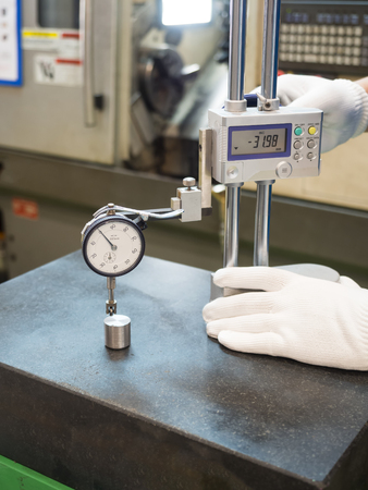 inspection CNC machining part by high gaugeの写真素材