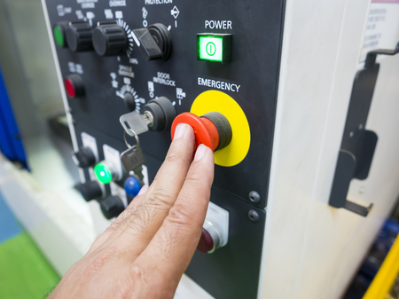 CNC Machine control panel closeup operator push emergency buttonの写真素材