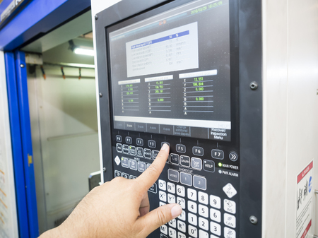 CNC Machine control panel close-up operator input programの写真素材