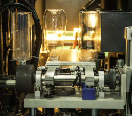 Plastic bottle hot blow manufacturing, bottle blow mold, bottle production machineの写真素材