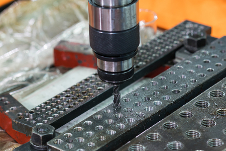 machining automotive parts by high precision machining centerの写真素材