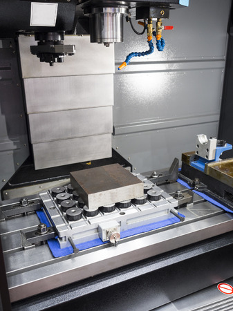 machining precision part by CNC machining center, High accuracy mold and die manufacturing by CNC high speed cutting machineの写真素材