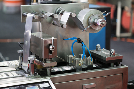 Automatic packing machine with plastic bag and paper box, high speed packing machine for food product industrial, high technology manufacturing processの写真素材