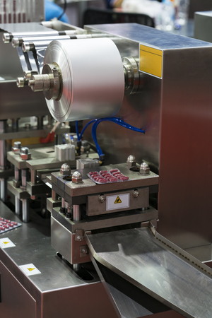 Automatic packing machine with plastic bag and paper box, high speed packing machine for food product industrial, high technology manufacturing processの写真素材