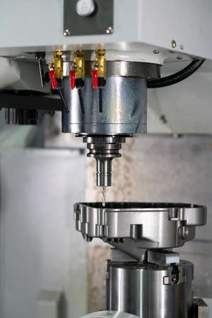 machining precision part by CNC machining center