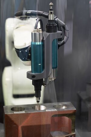 machining precision part by CNC machining centerの写真素材