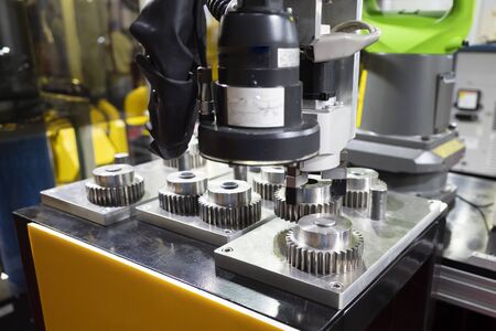operator inspection high precision part by automate vision system, Automotive gear quality comtrol by automatic programing by high precision camera systemの写真素材
