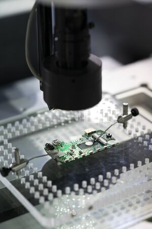 operator inspection high precision part by automate vision system, Automotive gear quality comtrol by automatic programing by high precision camera systemの写真素材