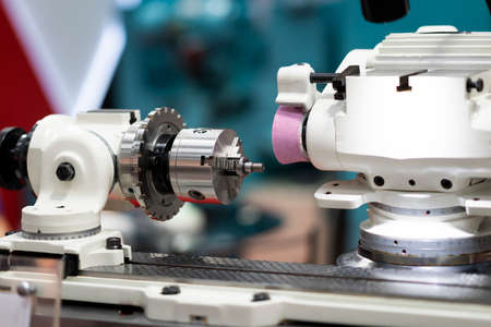 operator grinding forging die parts by high precision grinding machine