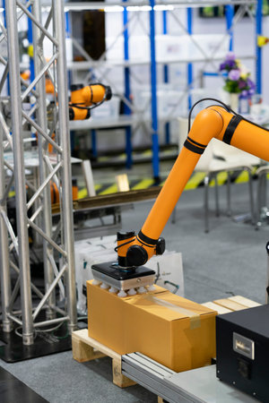 High-tech manufacturing process with robot programming arm in automation systemの写真素材