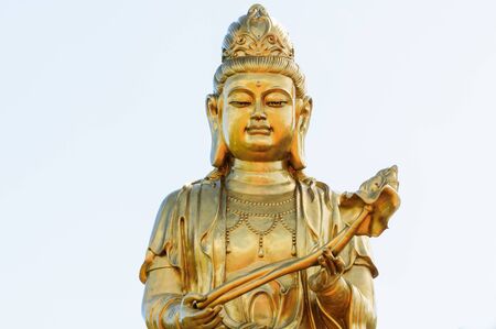 Statue of Guan Yin on white backgroundの写真素材