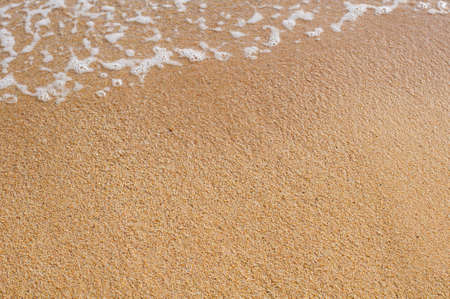 Soft wave of the sea blow up the coastの写真素材