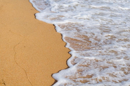 Soft wave of the sea blow up the coastの写真素材