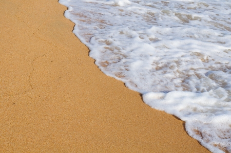 Soft wave of the sea blow up the coastの写真素材