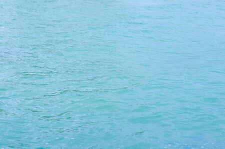 Background the sea water surface and textureの写真素材