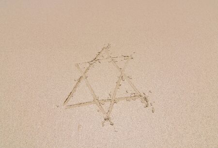 Draw a star background on the sandの写真素材