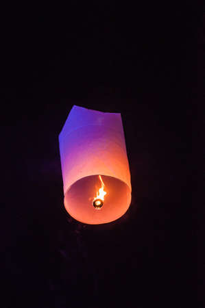 Single Floating Lantern during Loy Kratong Festival in Thailandの写真素材