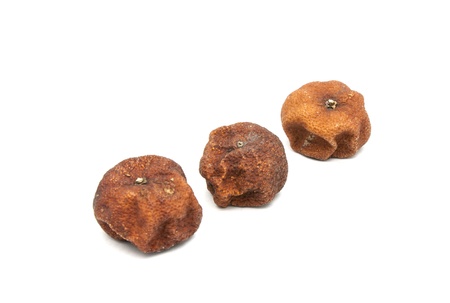 Orange dry and rotted on white backgroundの写真素材