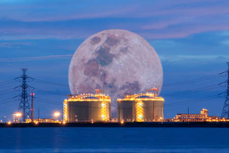 Power stations edge the sea at Rayong, Thailand.の写真素材