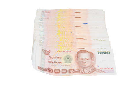 a lot of one thousand baht on white backgroundの写真素材
