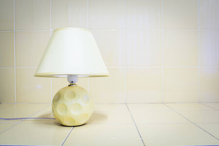 The table lamp yellow tiles a backgroundの写真素材