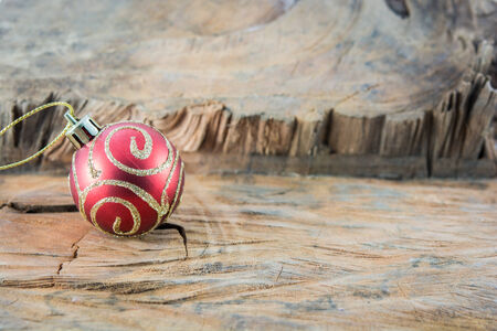 Part of Christmas red ball on wood backgroundの写真素材