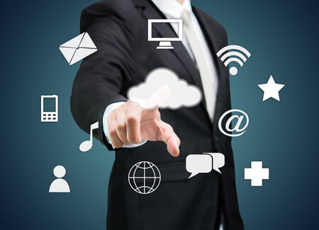 Businessman hand touch cloud computing concept on drak background
