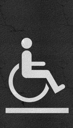disabled person sign asphalt highway road texture with markings backgroundの写真素材