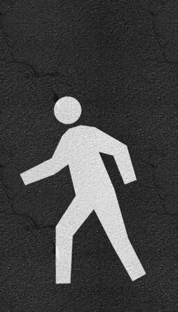 Pedestrian symbol on Asphalt road texture and lines of traffic