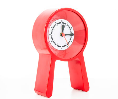 Red modern clock isolated on over white background