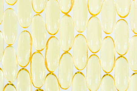 Omega 3 fish oil capsules texture backgroundの写真素材