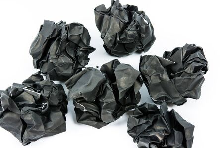 Black paper ball corrugate isolate on over white backgroundの写真素材