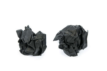 Black paper balls corrugate isolate on over white backgroundの写真素材