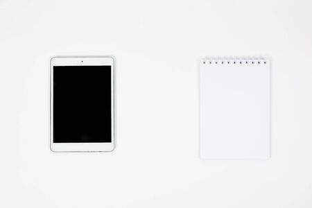 Top View Tablet Paper Book on white tableの写真素材