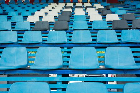 Sport stadium plastic chairs on bleachers view rowの写真素材
