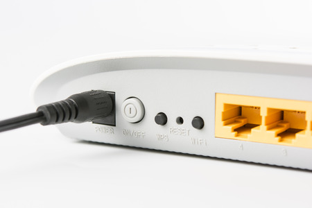 Wireless modem router network hub on white backgroundの写真素材