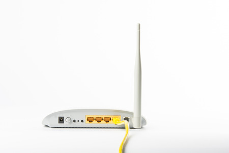 Wireless modem router network hub on white backgroundの写真素材