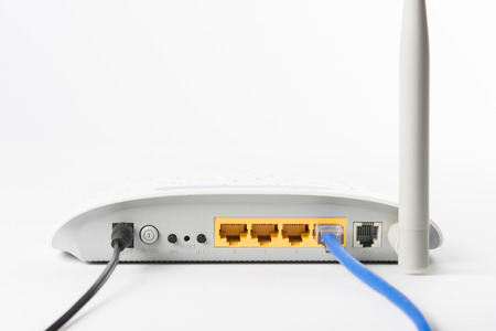 Wireless modem router network hub on white backgroundの写真素材