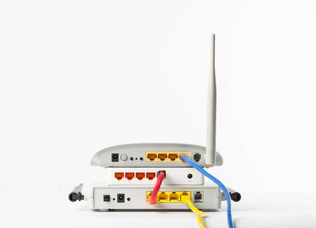 Wireless modem router network hub on white backgroundの写真素材